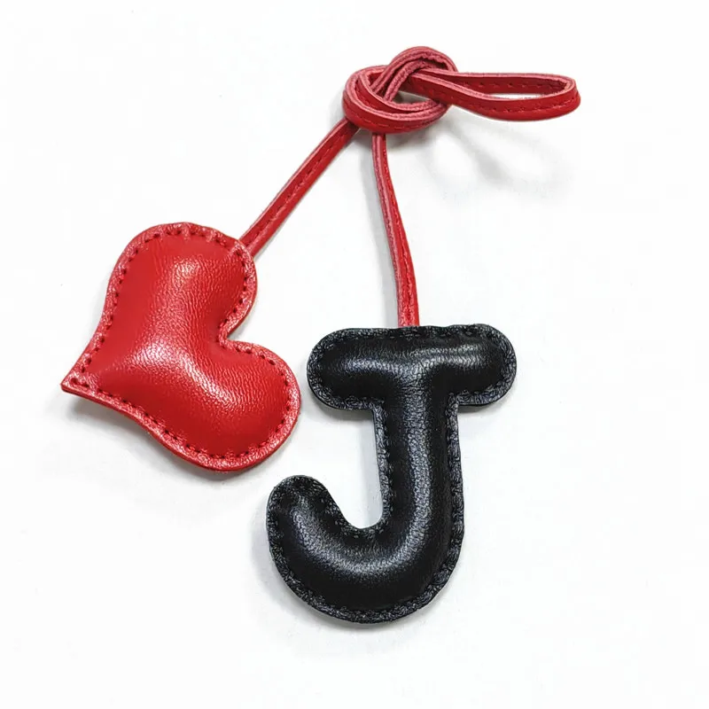 

Genuine leather J with heart-shaped letter style bag decoration with pure handmade stitching, high-end car keychain accessories