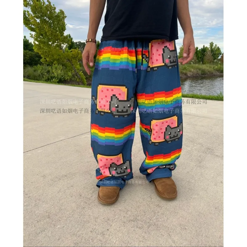 نيان كات بكسل طباعة السراويل الرجال 2025 جديد المتضخم فضفاض الشارع الشهير قوس قزح نمط بناطيل كاجوال Harajuku موضة مريحة