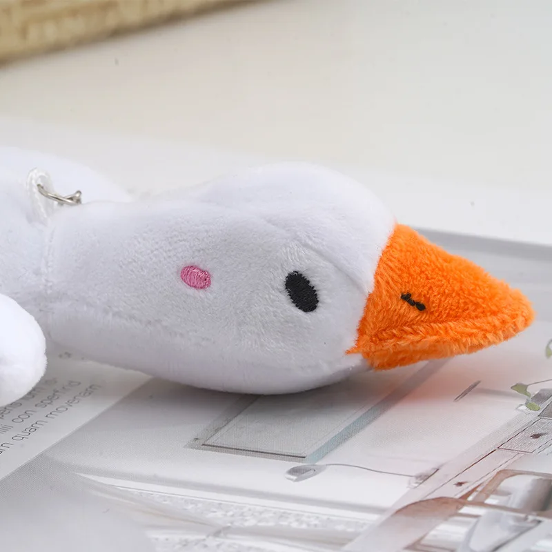 Porte-clés d'oie en peluche de dessin animé, oreiller de beurre, jouets de canard moelleux, animal mignon, 1PC