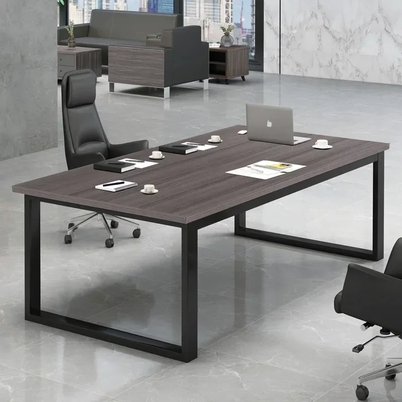 Modern-style wooden conference table with steel legs designed by Business Multimedia School and the Ministry of the Interior