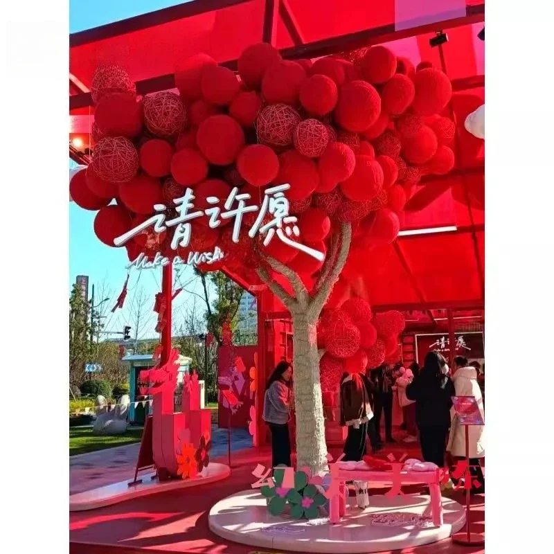 Shopping mall holiday atmosphere layout red braided wool ball tree Internet celebrity scene to build beautiful decorative orname
