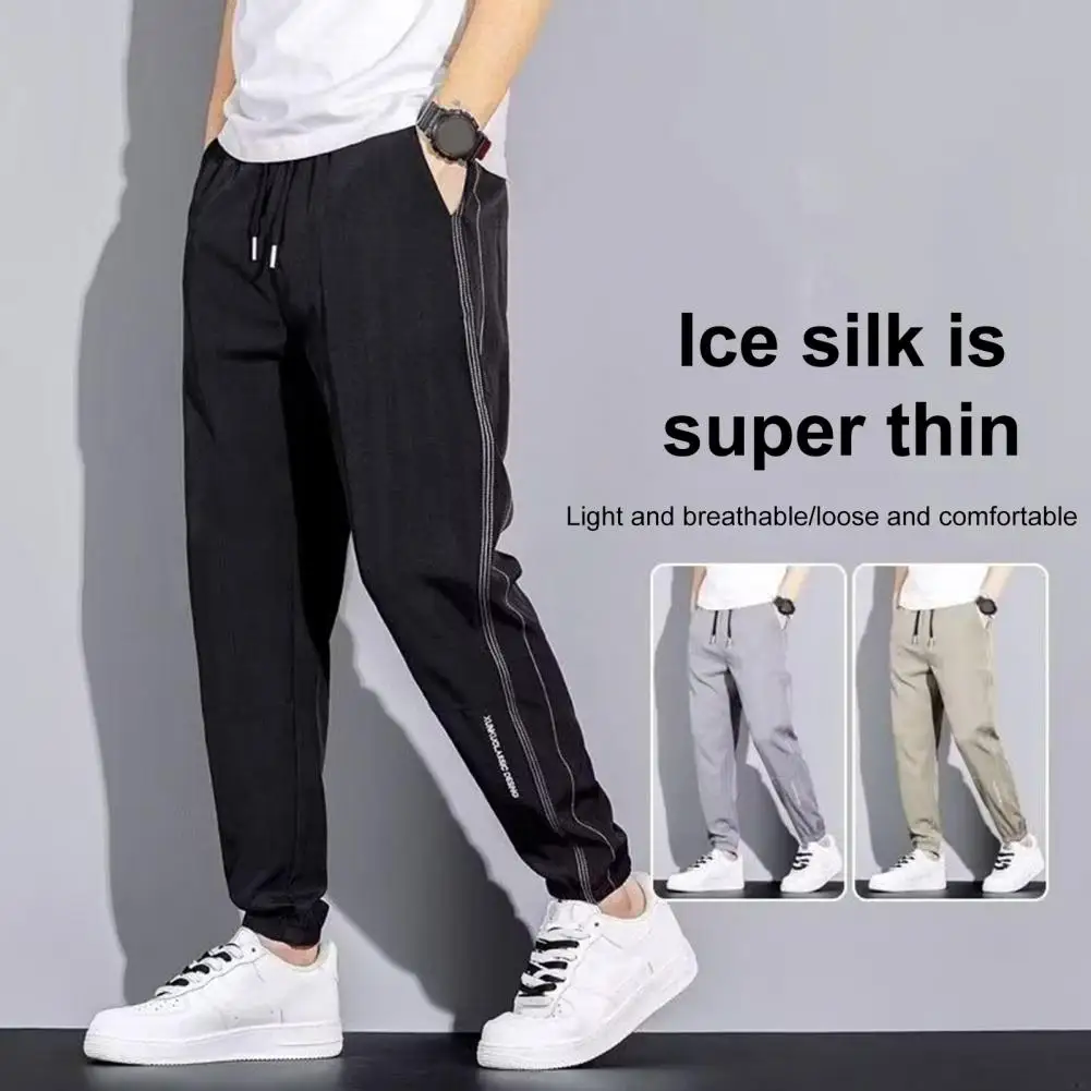 Nuovi pantaloni Cargo da uomo larghi di grandi dimensioni dritti Multi-tasca solido kaki Versatile abbigliamento da lavoro pantaloni Casual da uomo in cotone Jogger