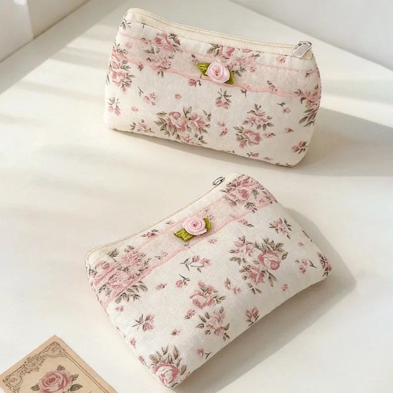 

Korean gentle rose change bag fabric small floral clutch bag cosmetic sample storage bag data cable storage