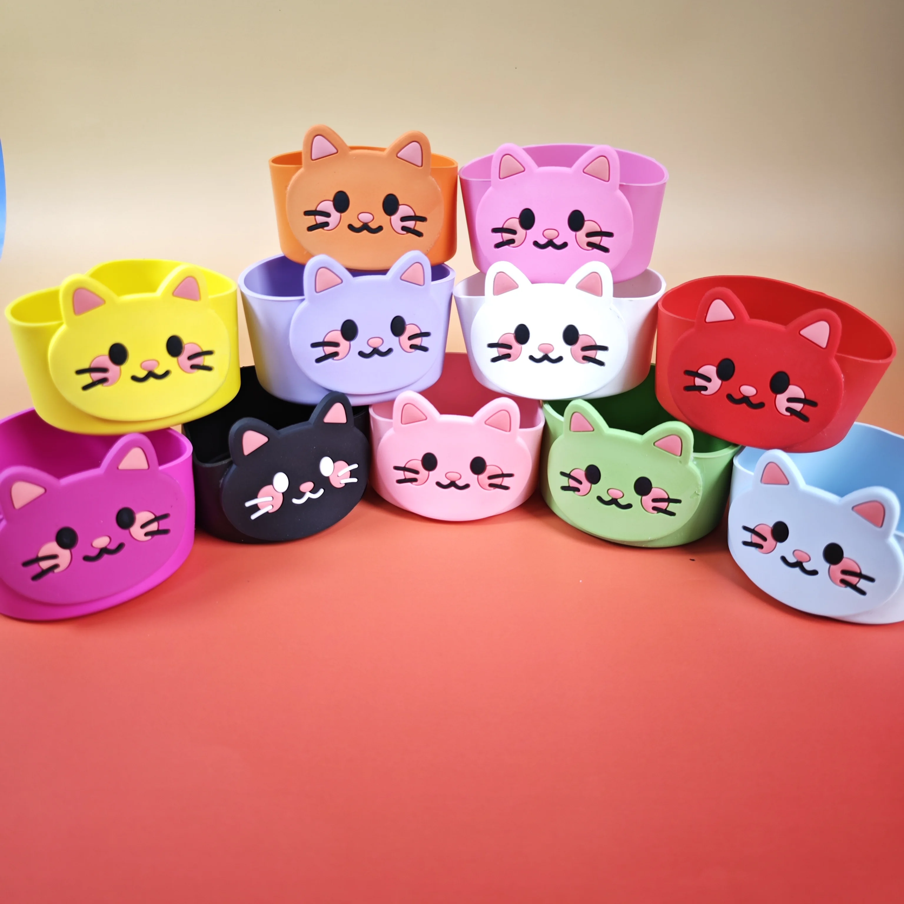 Hot-selling cartoon silicone cup sleeves, soft rubber, cute little cat design, heat-resistant and insulating for for for for Tum