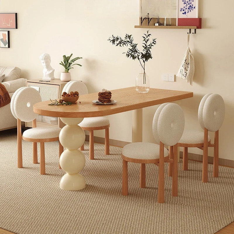 

Nordic cream style dining table and chairs, a set of small apartment log style dining table