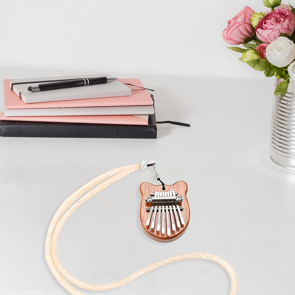 

Eight-tone Mini Pendant Portable Kalimba Light Brown Small Piano Musical Toy Thumb Instrument Beginner Finger Plaything