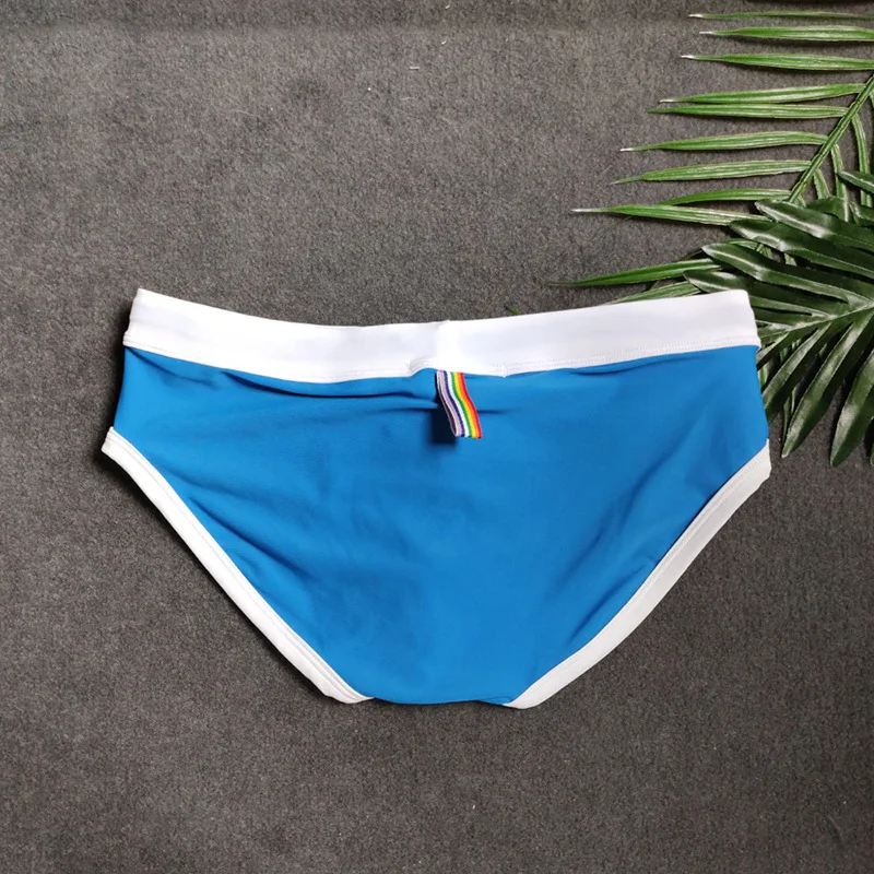 2026 color triangle swimming trunks close-fitting color matching thickened nylon foreign trade swimsuit UXH043