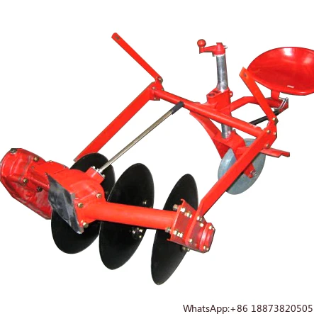 Walking tractor driven disc plow