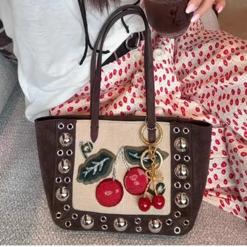 

Brand Embroidered Cherry Handbag Luxury Trend Rivet Basket Tote Bag Exquisite Canvas Frosted Stitching Shoulder Bag Women's Bag