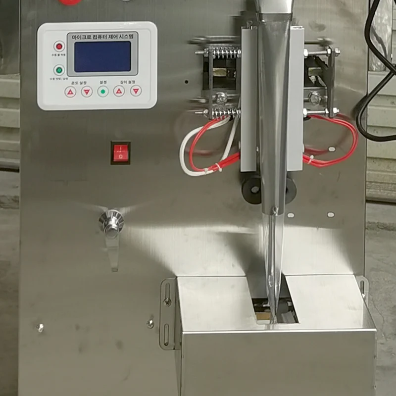 

Упаковочная машина из нержавеющей стали Многофункциональная машина для запечатывания жидкостей в пасту Автоматическая упаковочная машина