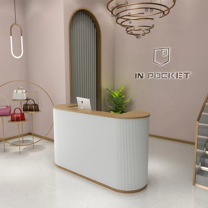 Clothing store curved checkout page store small beauty salon front desk light luxury nail salon simple modern