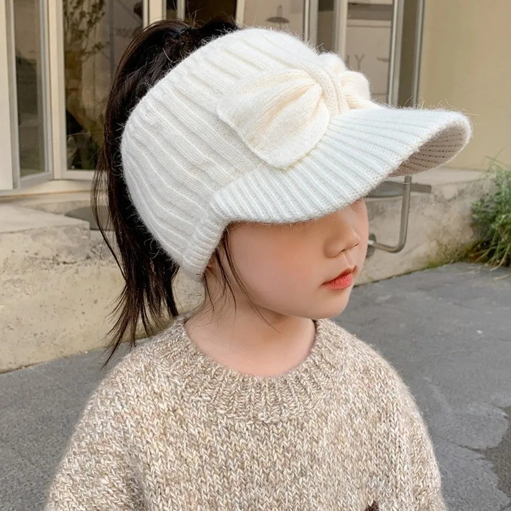 

Fashion Empty Top Ear Protection Hat Bow Knitted Duck Tongue Hat Earmuffs Cap Winter
