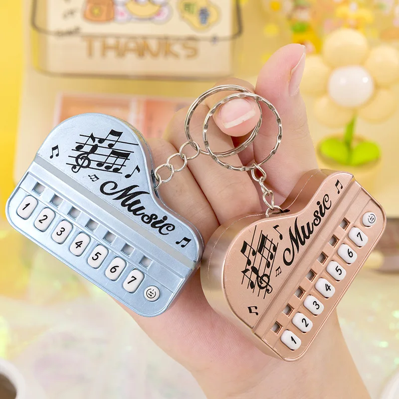 Mini Piano Electrónico Creativo con Llavero, 7 Teclas Luminosas, Juguete Musical, Colgante para Mochila Infantil, Regalo de Bolsillo