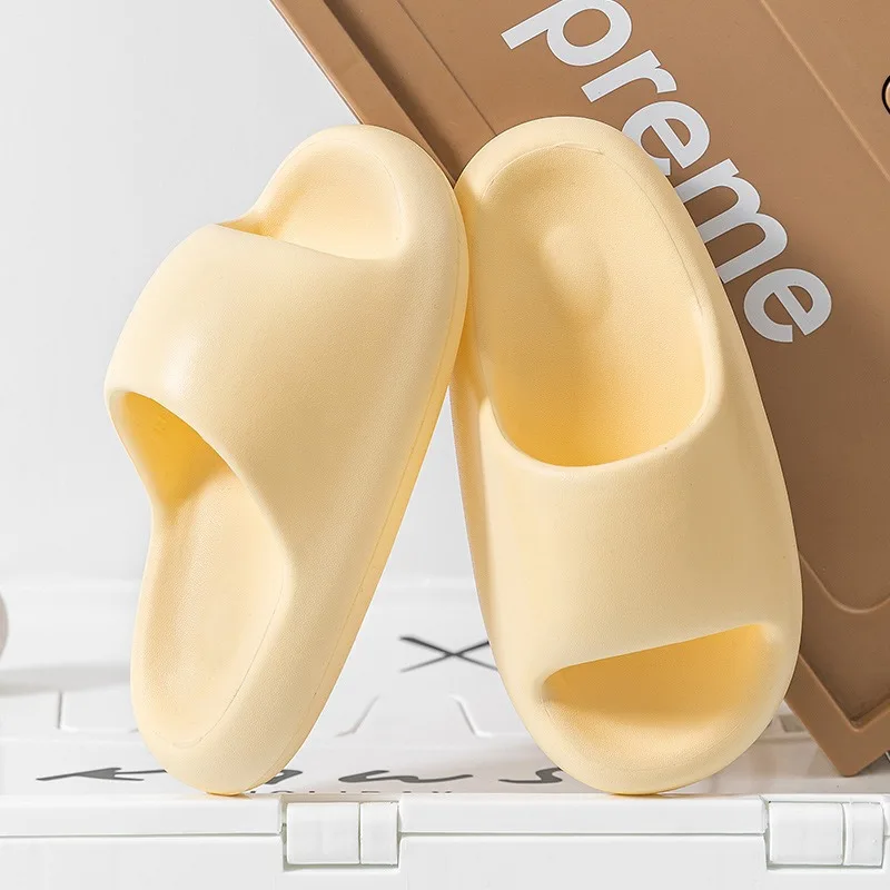 Mode femmes pantoufles été plat léger EVA maison salle de bain pantoufles confort Massage Couples intérieur diapositives chaussures de douche