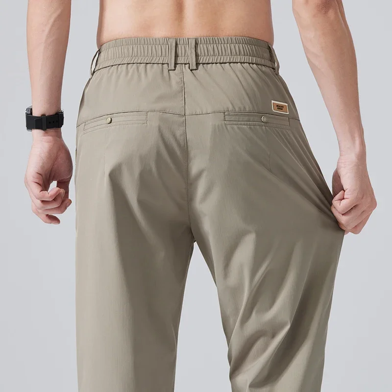 Letnie, cienkie, lodowe jedwabne, dopasowane spodnie męskie, elastyczne, proste, modne, codzienne spodnie 9/10, klasyczne męskie spodnie dresowe do joggingu.