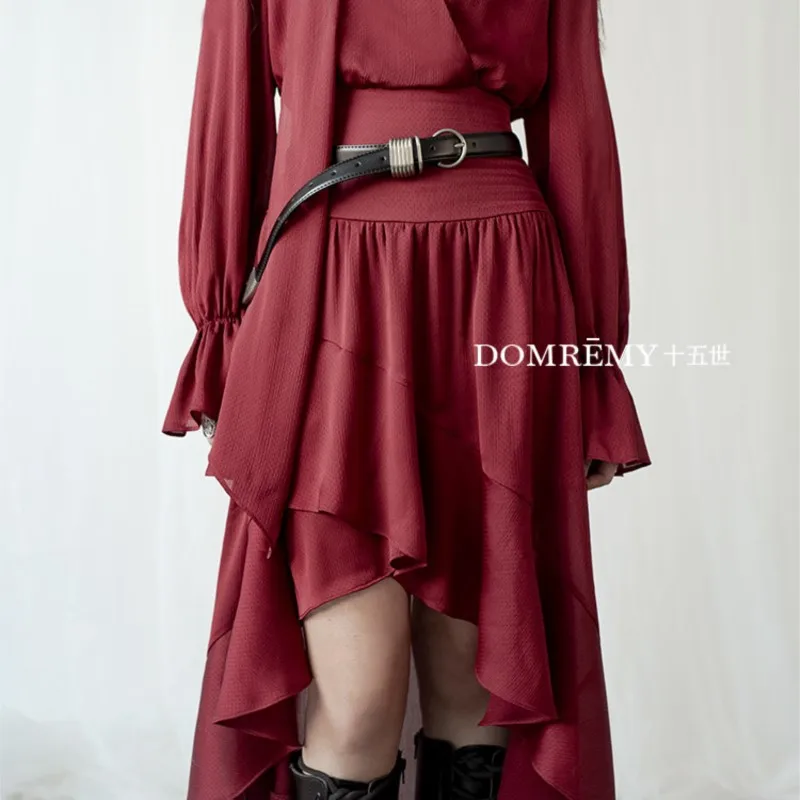 A shirt dress with short front and long back exuding flowing elegant charm
