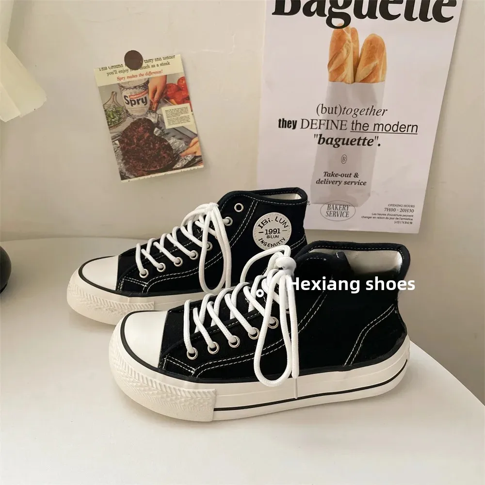 جديد 2025 نسخة واسعة عالية الجودة برأس مانجو على الطراز الكوري أحذية قماشية متعددة الاستخدامات للنساء أحذية خفيفة الوزن قابلة للتنفس