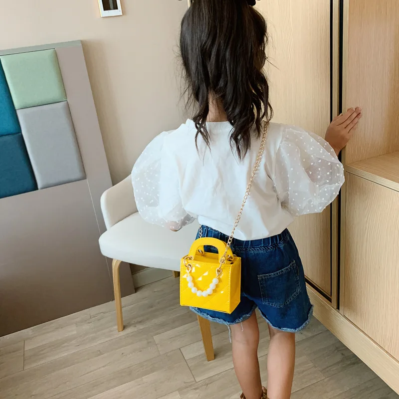 Bolsa pérola estilo coreano infantil, bolsa tiracolo de menina, bolsa de ombro única cor sólida, corrente, pequena, marca de tendência, nova, 2023