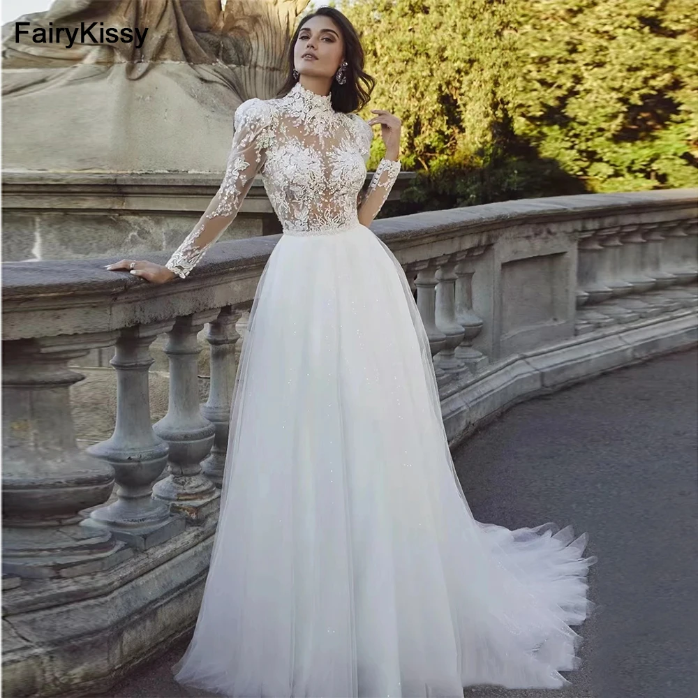 

FairyKissy Women Gorgeous Applique Tulle Wedding Dress with Daring Deep V-Neck Off Shoulder Long Sleeves Romantic Bridal Gown