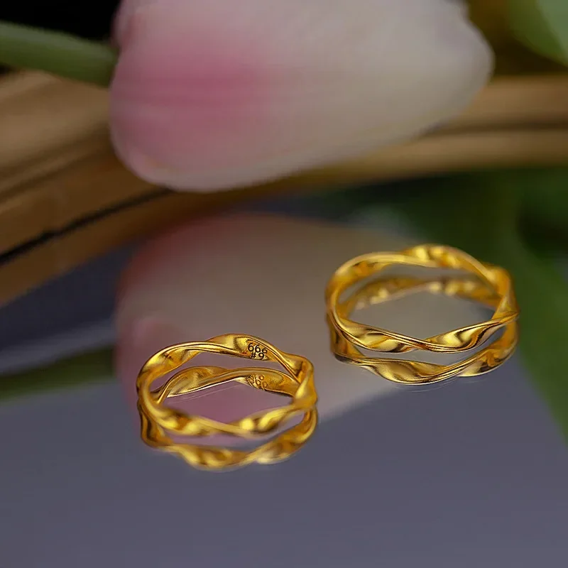 

9999 Real Gold 24K Mobius Ring Couple Ring Niche Fashion High-end Ring Twist Men's and Women's