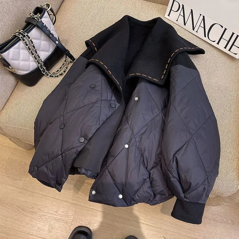 

Женская одежда 2025: Новая зимняя модель для полных женщин – черная стеганая хлопковая куртка свободного кроя с большим отложным воротником