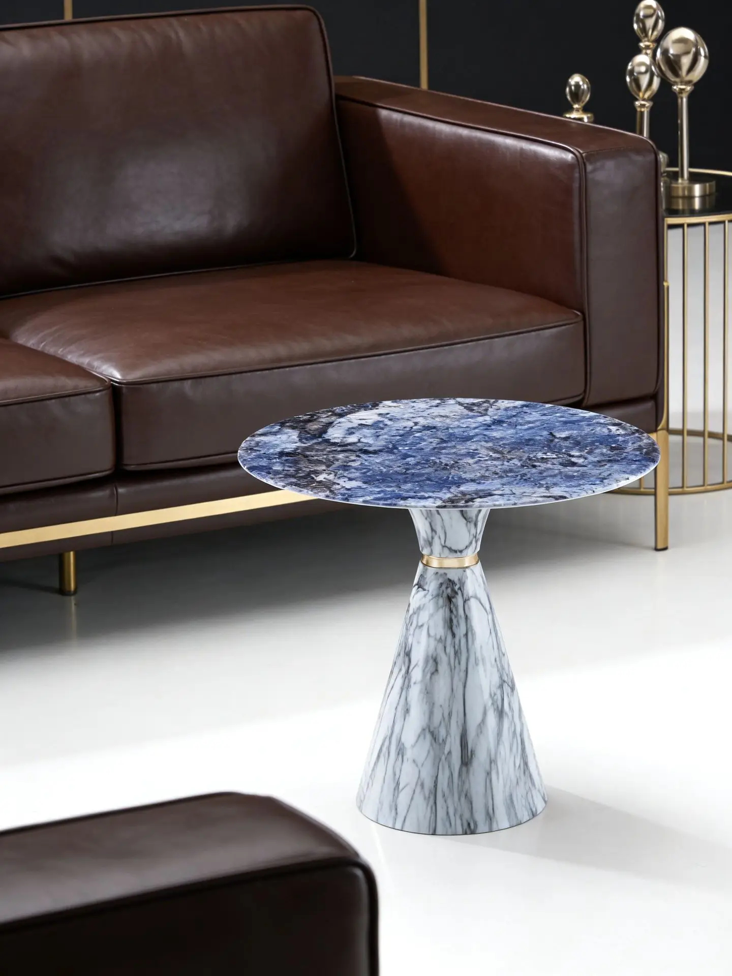 Blue-and-white contrasting marble side table with natural texture sintered stone countertop paired with gilded waistline