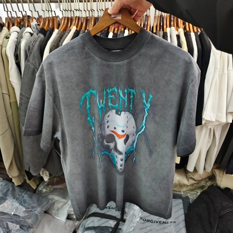 

Y2K Streetwear Horror T-Shirt - Oversized Gray Washed Distressed Tee with Creepy Mask Graphic