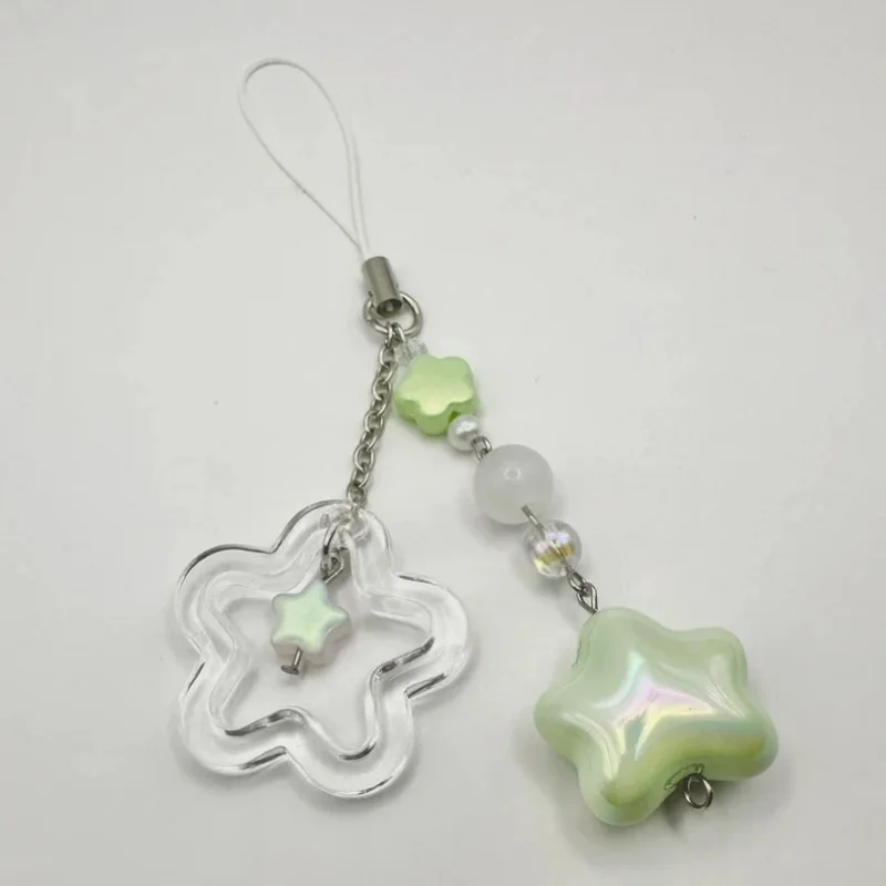 Chunky green Star handcrafted by Y2K. It comes attached to a white lanyard phone strap, wallet, binder, camera or handheld game