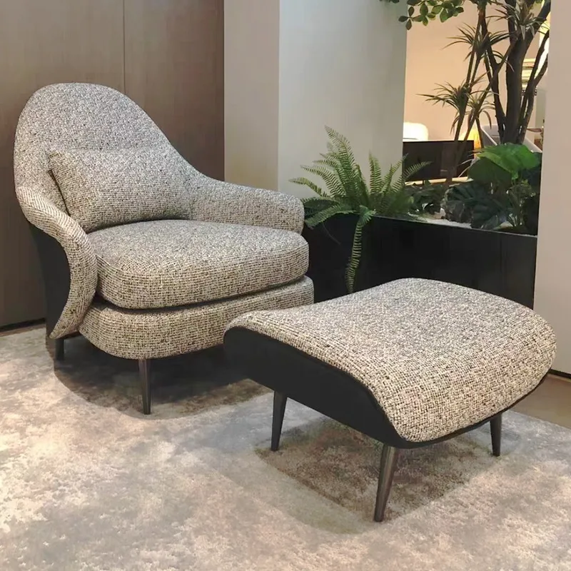 

Elegant Armchair and Ottoman Set with Plush Cushioning and Modern Design for Stylish Comfort in Any Space