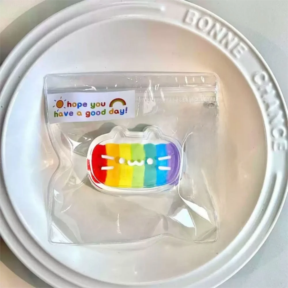 Suave Arco Iris gato pellizco Mochi rebote lento apretar alivio del estrés PU Fidget adulto