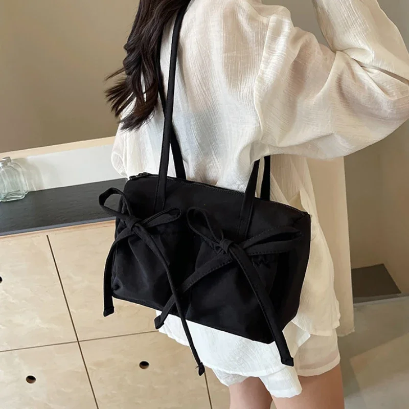 2024 New Korean Bow Nylon Shoulder Bag Fashionable and Sweet Design Tote Bag Folded Large Capacity Commuter Women's Handbag