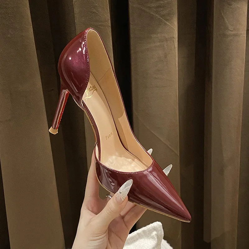 New patent leather design temperament high heels women's thin heels pointed side empty burgundy red background 3715