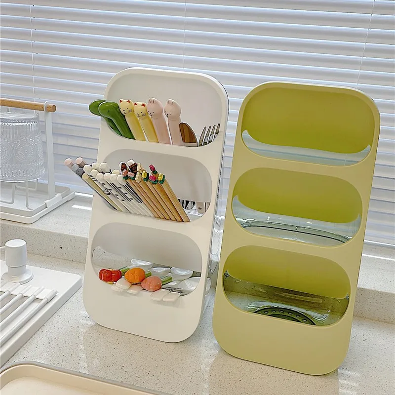 

Multi-layer divided draining chopstick storage box and spoon rack on the household kitchen countertop