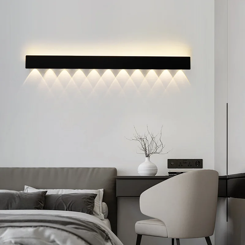 

Настенный светильник Современный простой прикроватный светильник для спальни Фон для гостиной Настенный светильник Одно слово Конденсаторная лампа