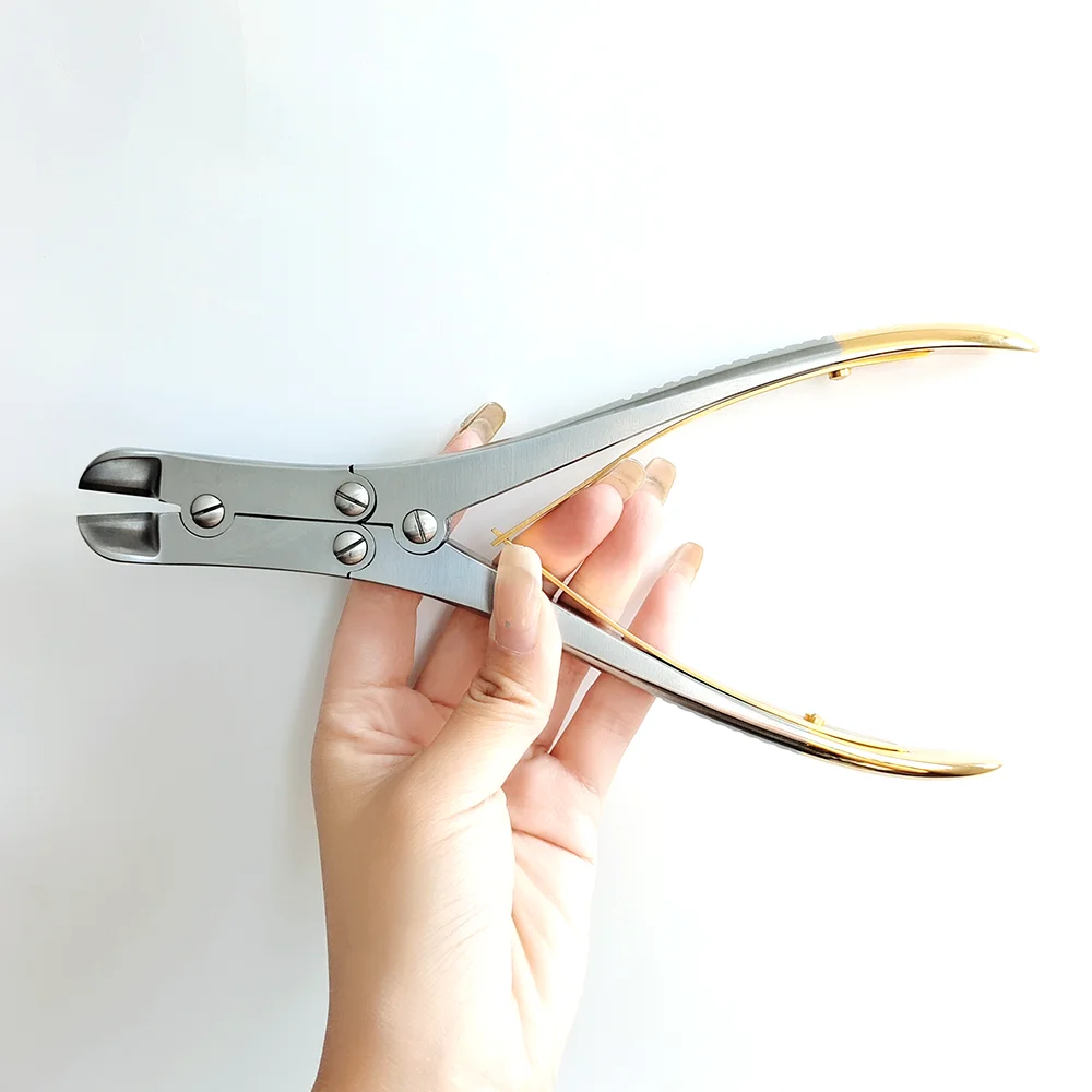 กรรไกรตัดลวดเหล็กคิร์ชเนอร์แบบมีด้ามจับทองคำ พร้อมเข็มเหล็กแบบสองข้อต่อ