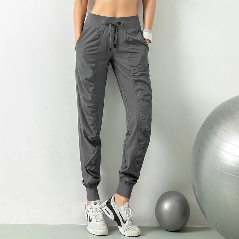 High-waisted Quick-drying Sports Pants Women\'s Loose Pleated Fitness Running Pants Were Thin Drawstring Harlan Casual Leggings