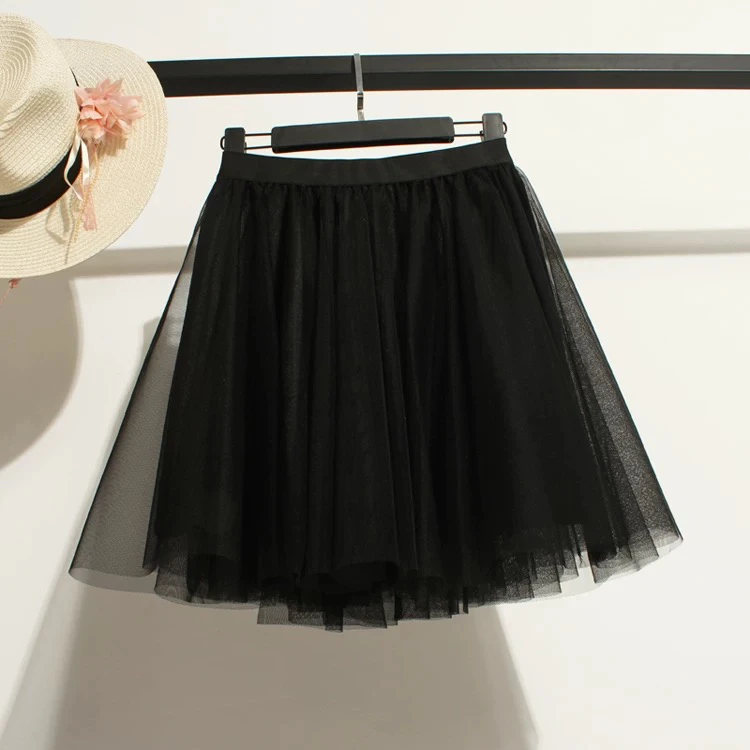 تنورة قصيرة بيضاء على شكل حرف A للسيدات موضة الربيع والصيف تنورة كورية على شكل مظلة شبكية تنورة عالية الخصر نصف الجسم