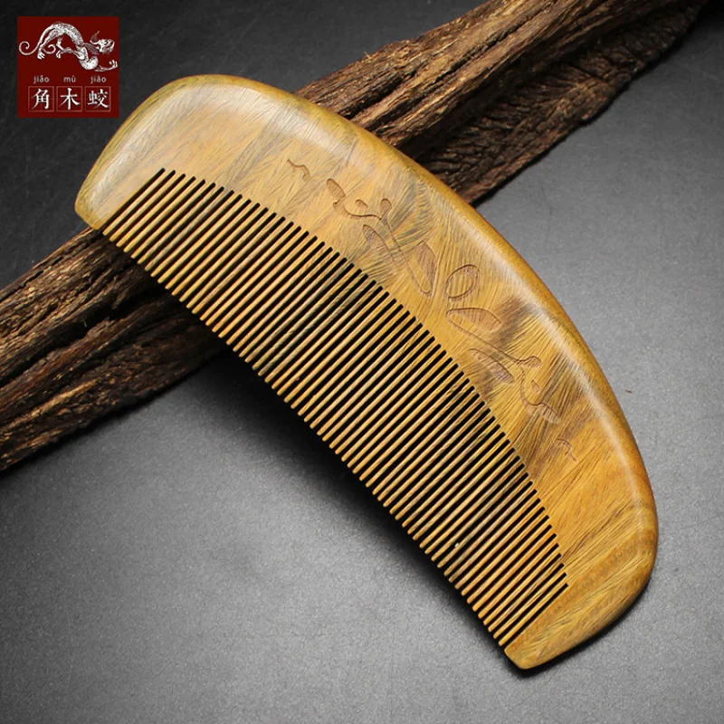 

Green , carved whole-wood Guangdong-style sandalwood comb
