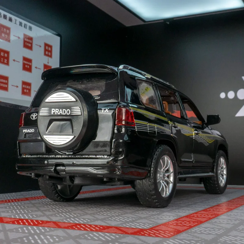 Modelo de vehículo todoterreno de aleación Toyota Prado 1:24, puertas de coche y capó de motor, el maletero se puede abrir detalles ricos, mano de obra fina