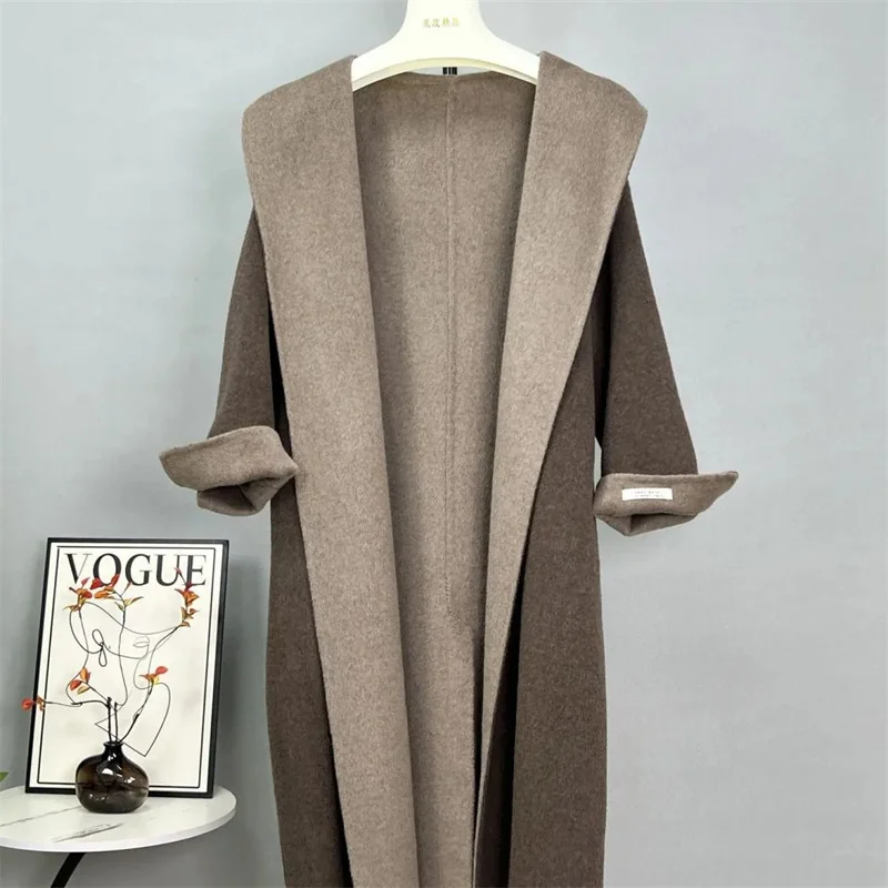 เสื้อโค้ทกันลมผ้าวูลลำลองสำหรับผู้หญิง รุ่นใหม่ ฤดูใบไม้ร่วง ฤดูหนาว ปี 2025 สไตล์เกาหลี ทรงหลวม ความยาวปานกลาง ผ้าวูลสองด้าน