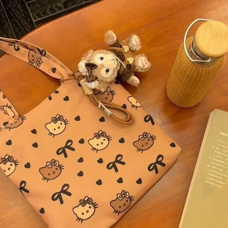Novo dos desenhos animados sanrio olá kitty bolsa menina lona sacola kitty bonito grande capacidade saco de almoço versátil saco de armazenamento estudante