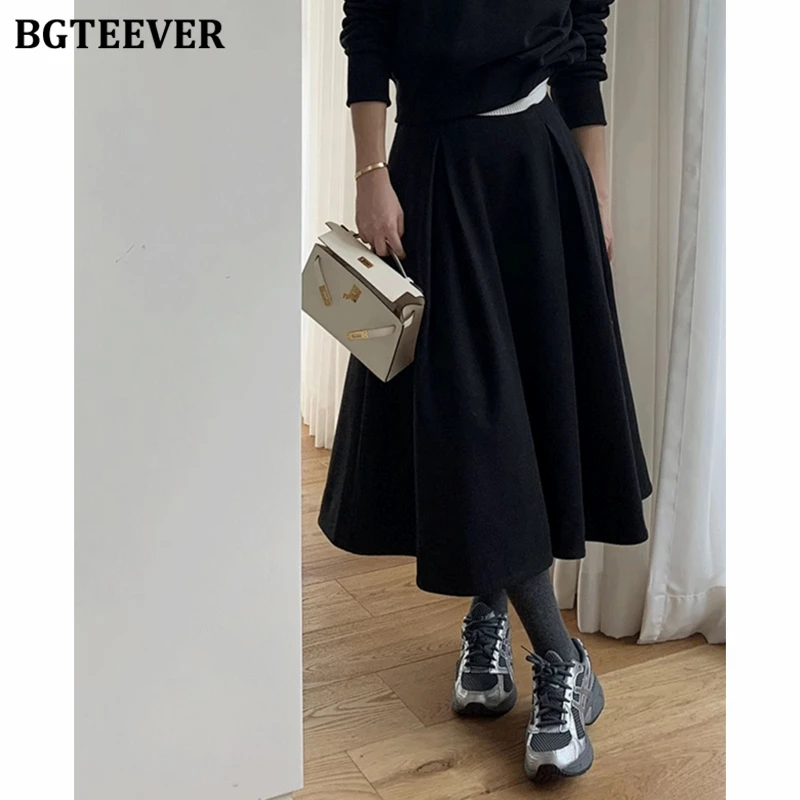 BGTEEVER أنيقة دافئة فضفاضة ألف خط منتصف طول التنانير للنساء الخريف الشتاء موضة عالية الخصر السيدات التنانير الصوفية