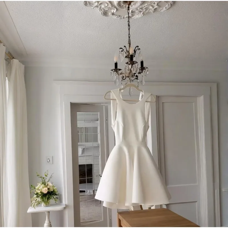 

Летнее элегантное женское платье 2026 года, однотонное, с круглым вырезом, без рукавов, с открытой спиной