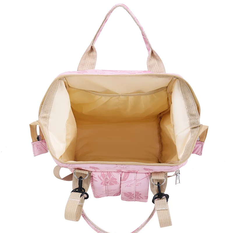 A lady hand-held large-capacity mummy bag, fashionable simple and fresh lovely, suitable for daily use with a baby