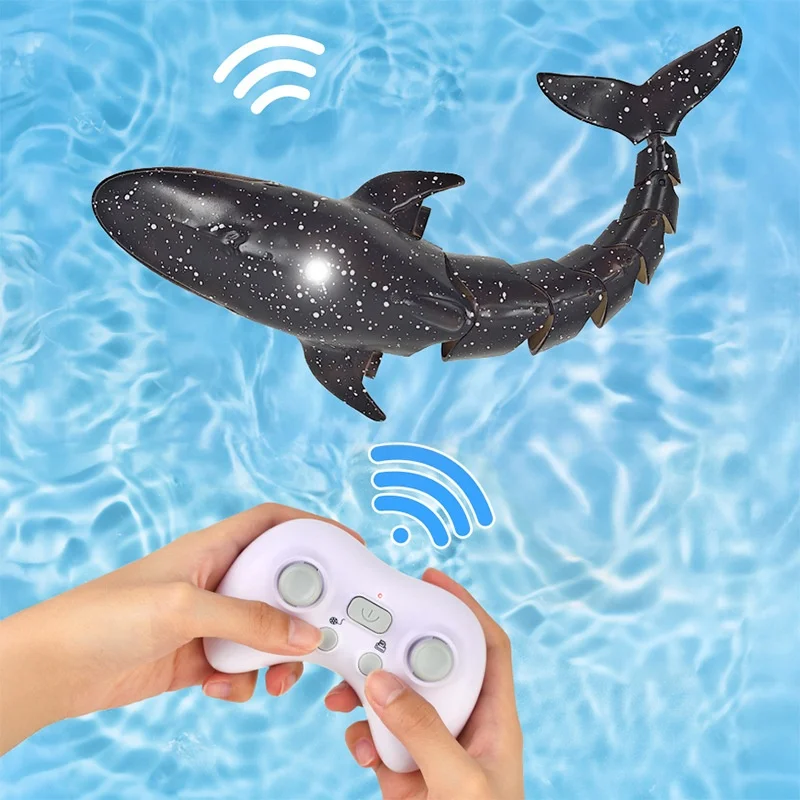 Dellin جديد التحكم عن بعد لعبة سمك الحوت الكهربائية بخاخات المياه محاكاة الحياة البحرية مستشعر الضوء المائي لعب الأطفال