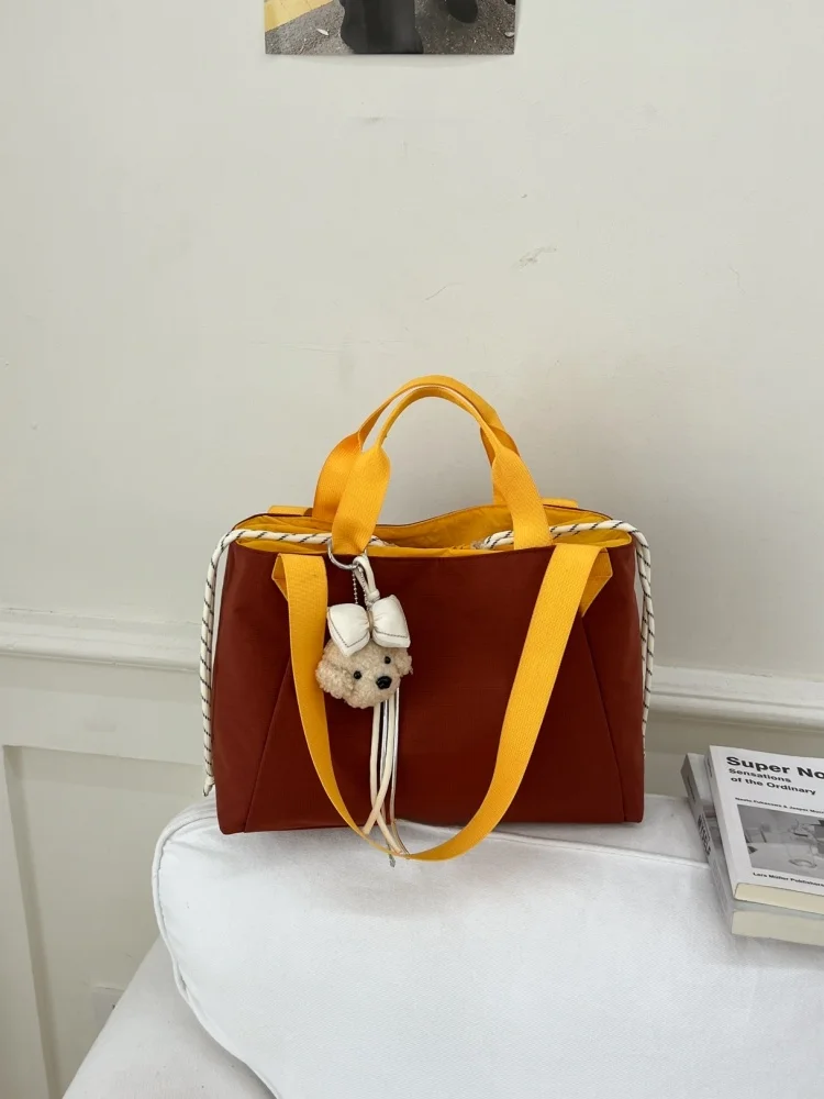 2026 New Color Block Women's Shoulder Bag Large Capacity Travel Sports Student Handbag Trendy Tote Bag Soft Fabric Bucket Shape