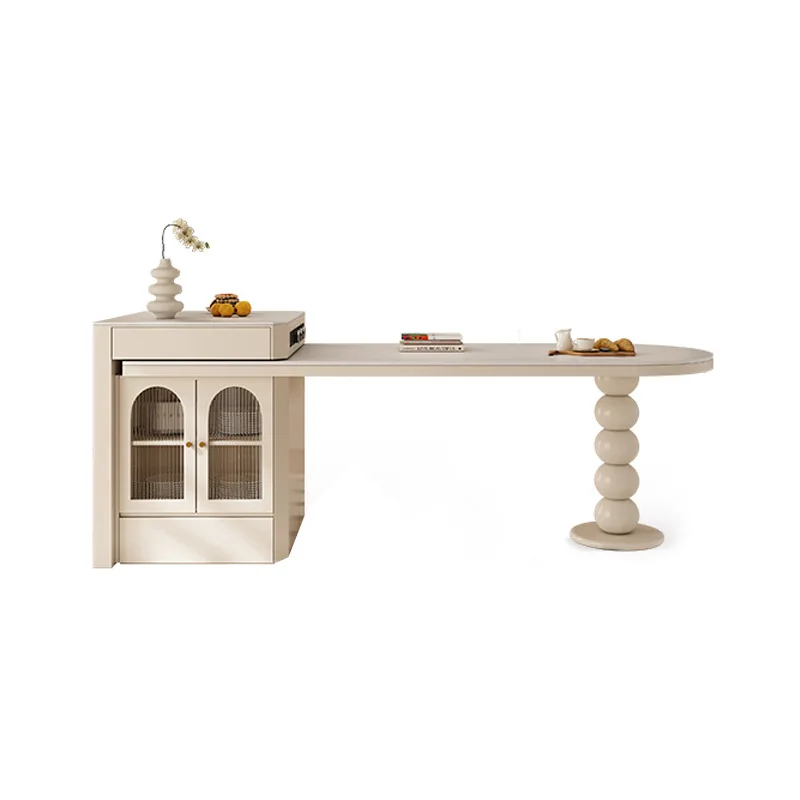 Island style dining table with integrated retractable home stone bar counter and island style kitchen