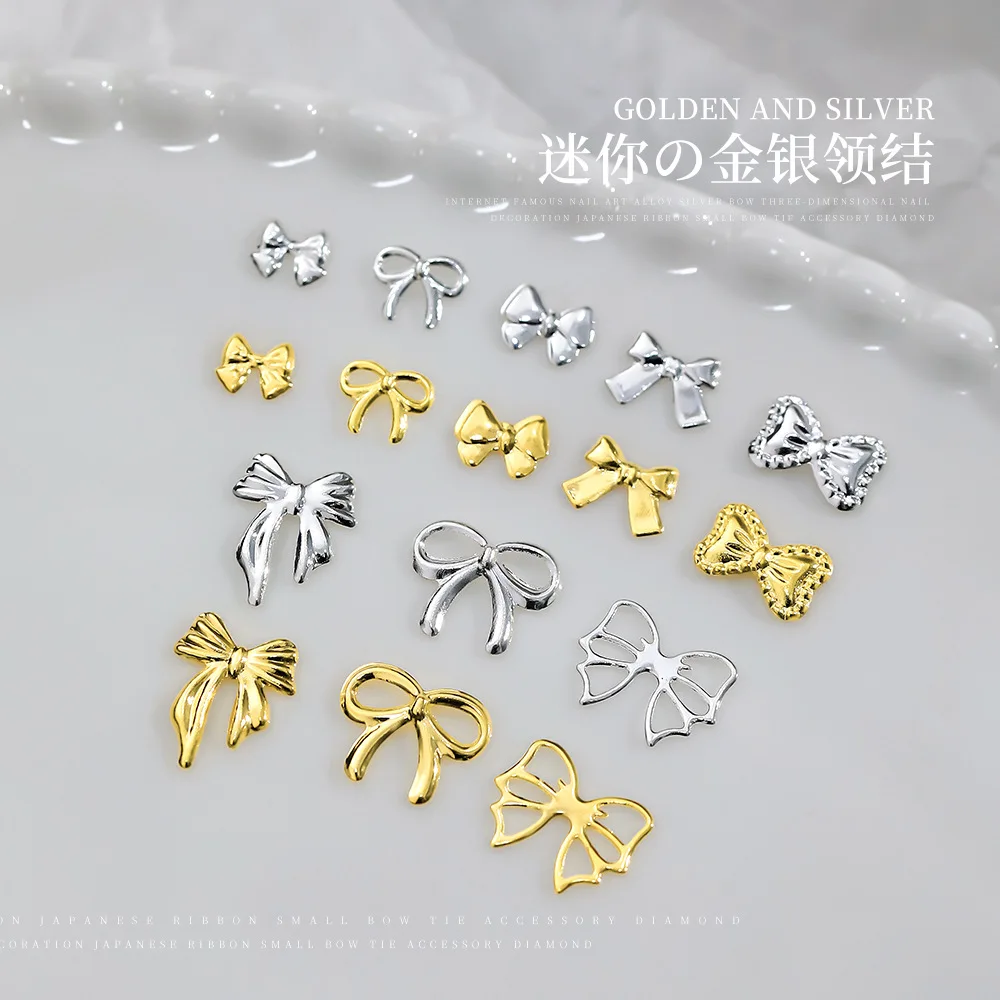 10 pezzi di accessori per Nail Art con fiocco in lega mista Charms 3D oro e argento di lusso Hollow Necktie Ribbon decorazione per unghie forniture parti