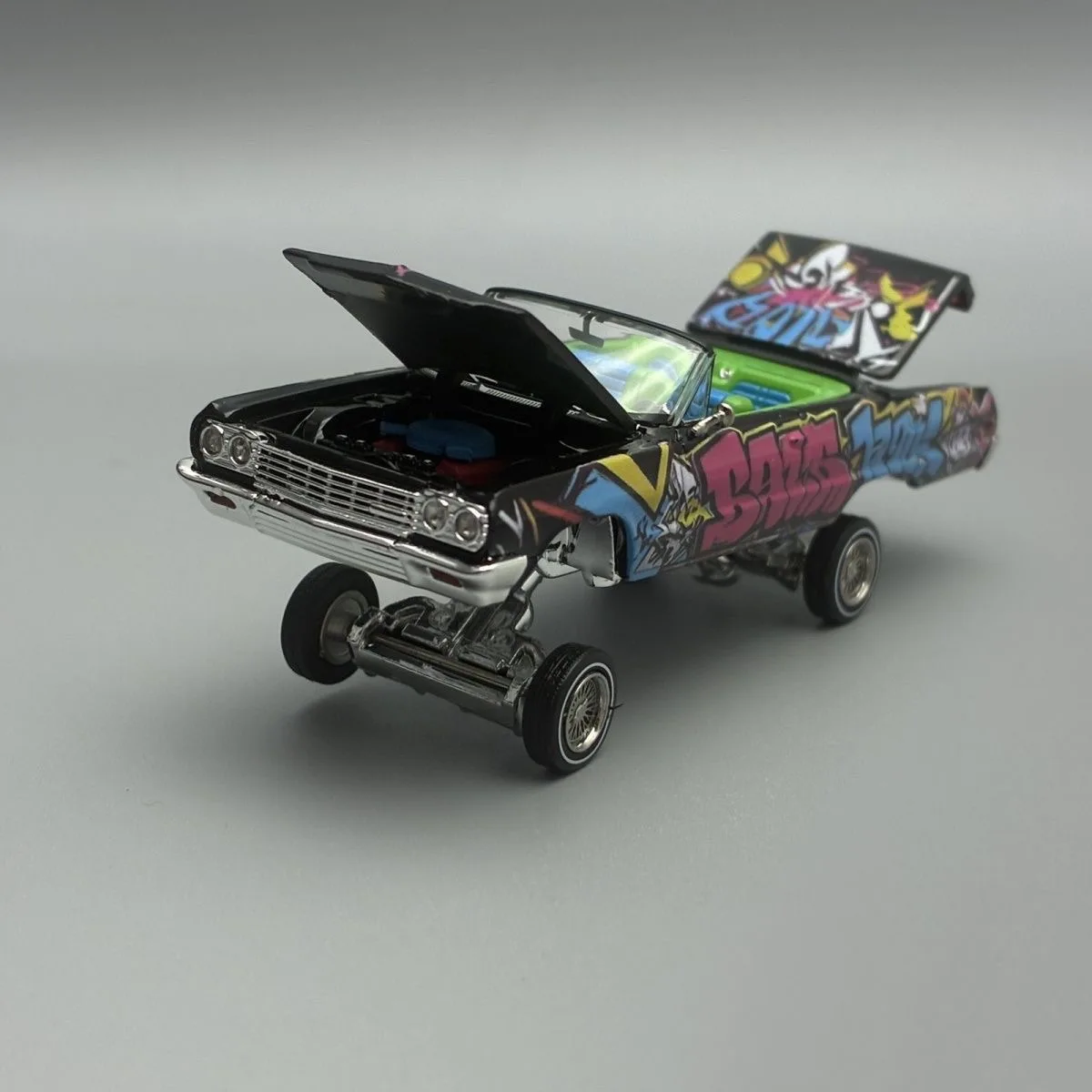 FineWorks 1/64 Impala Coast Jumping, Modelo de Auto de Aleación