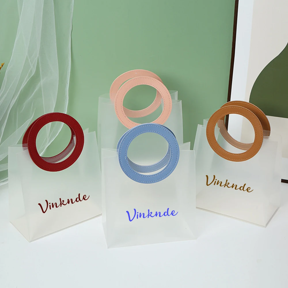 

Customized PP PVC Wedding Party Portable Frosted Bag With Logo Bulk for Packaging Plastic Handle Gift Shopping Cosmetic Bags